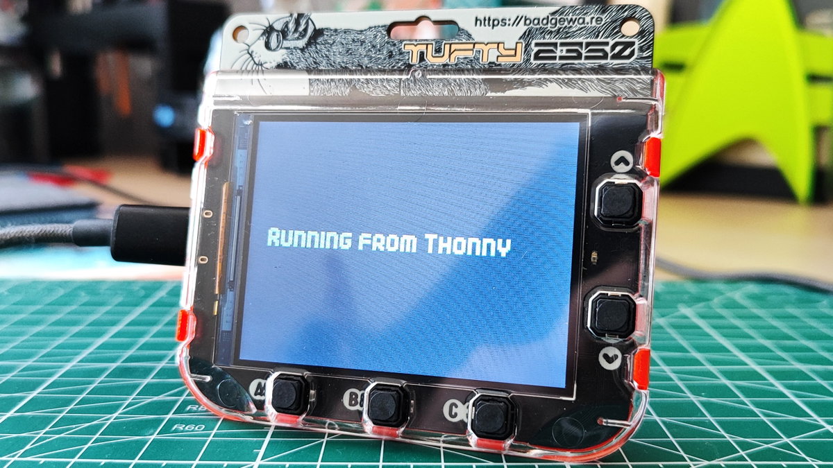 Badgeware device displaying RUNNING FROM THONNY