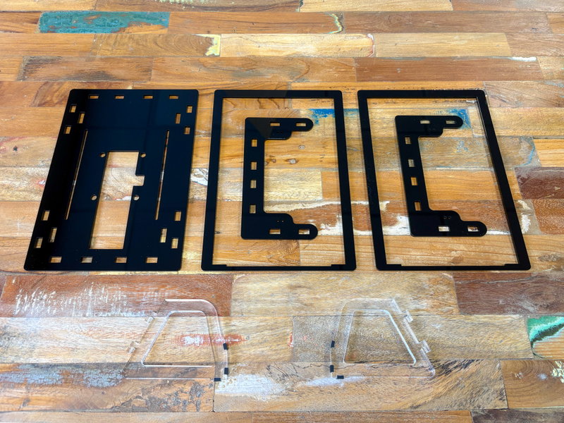 Acrylic frame parts with protective plastic peeled off