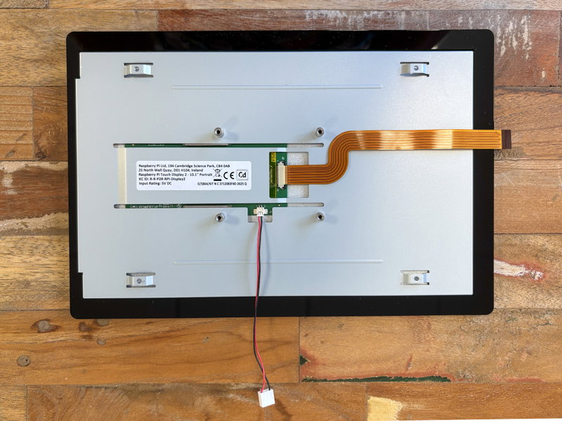 Display with both ribbon and power cables connected