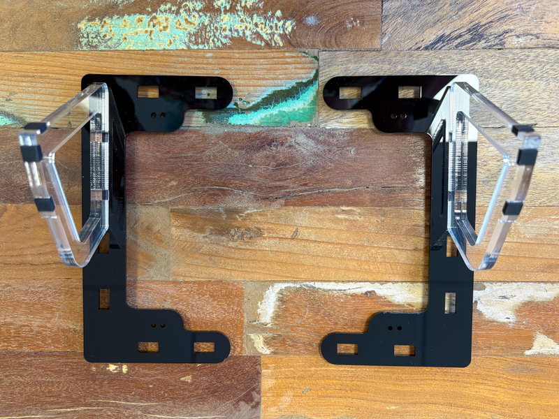 Legs inserted into the slots on the mounting plates