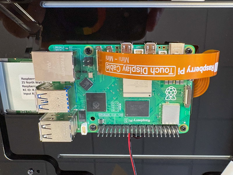 Raspberry Pi 5 placed on the display standoffs