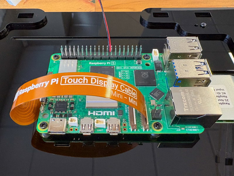 Raspberry Pi 5 fastened to the standoffs with M2.5 screws