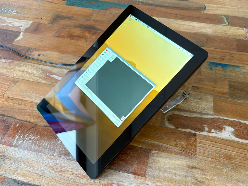 Side view of reclining display setup