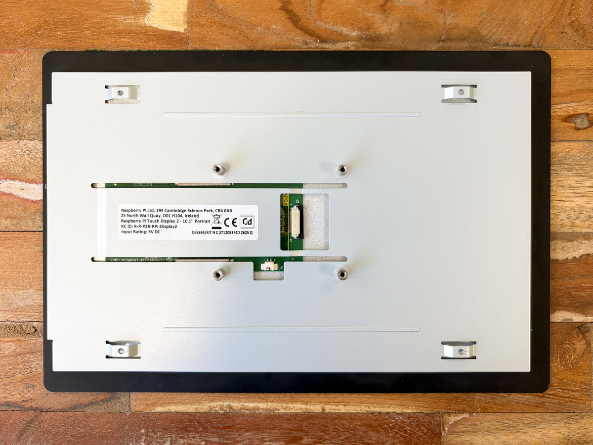 Raspberry Pi Touch Display 2 placed face down on a flat surface