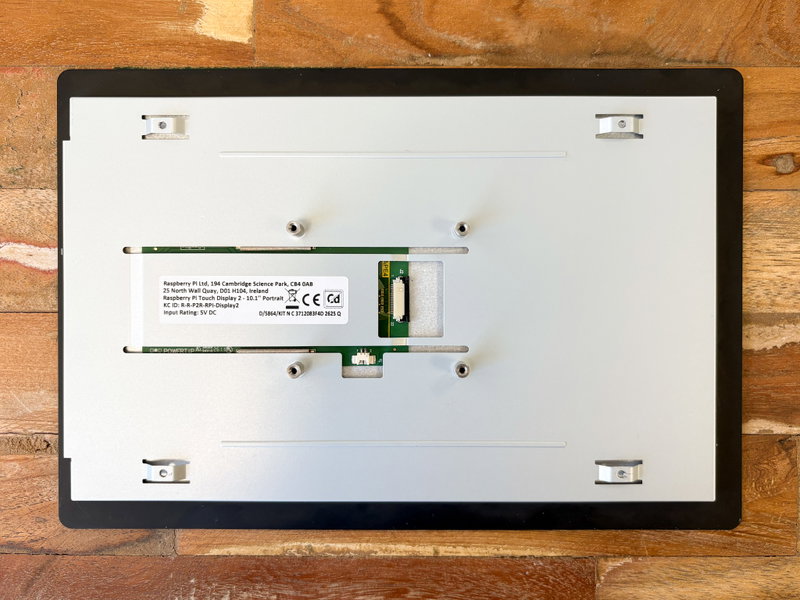 Raspberry Pi Touch Display 2 placed face down on a flat surface