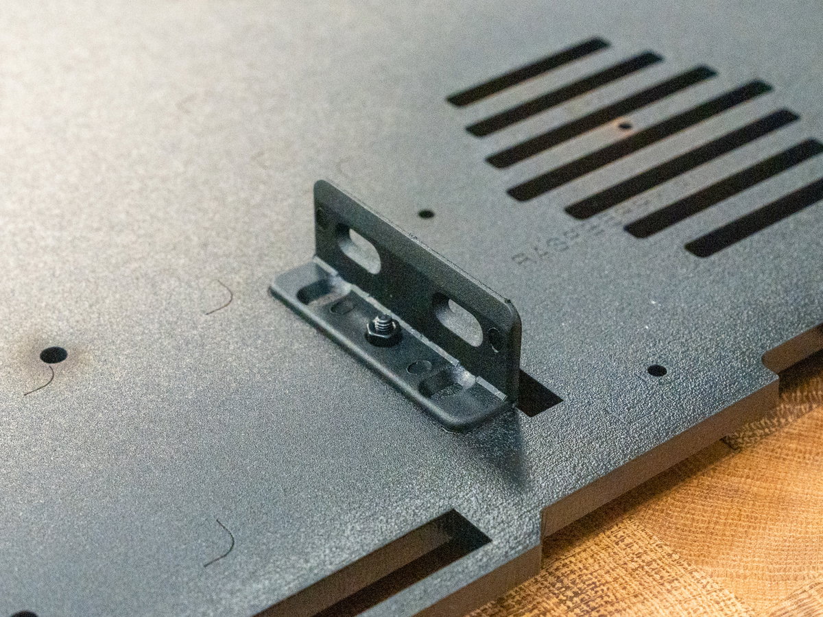 L-shaped bracket attached to the centre of panel A