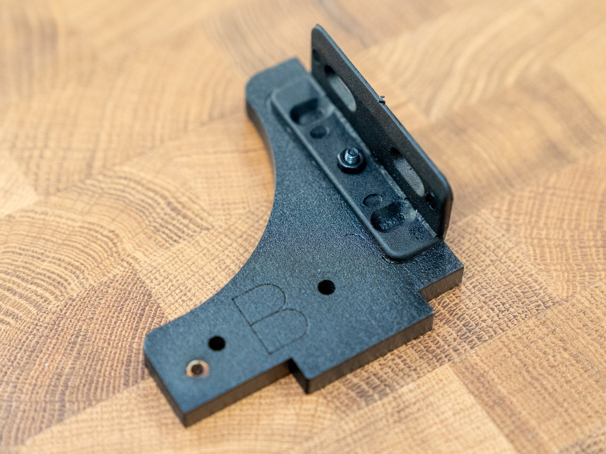 L-shaped bracket attached to panel B