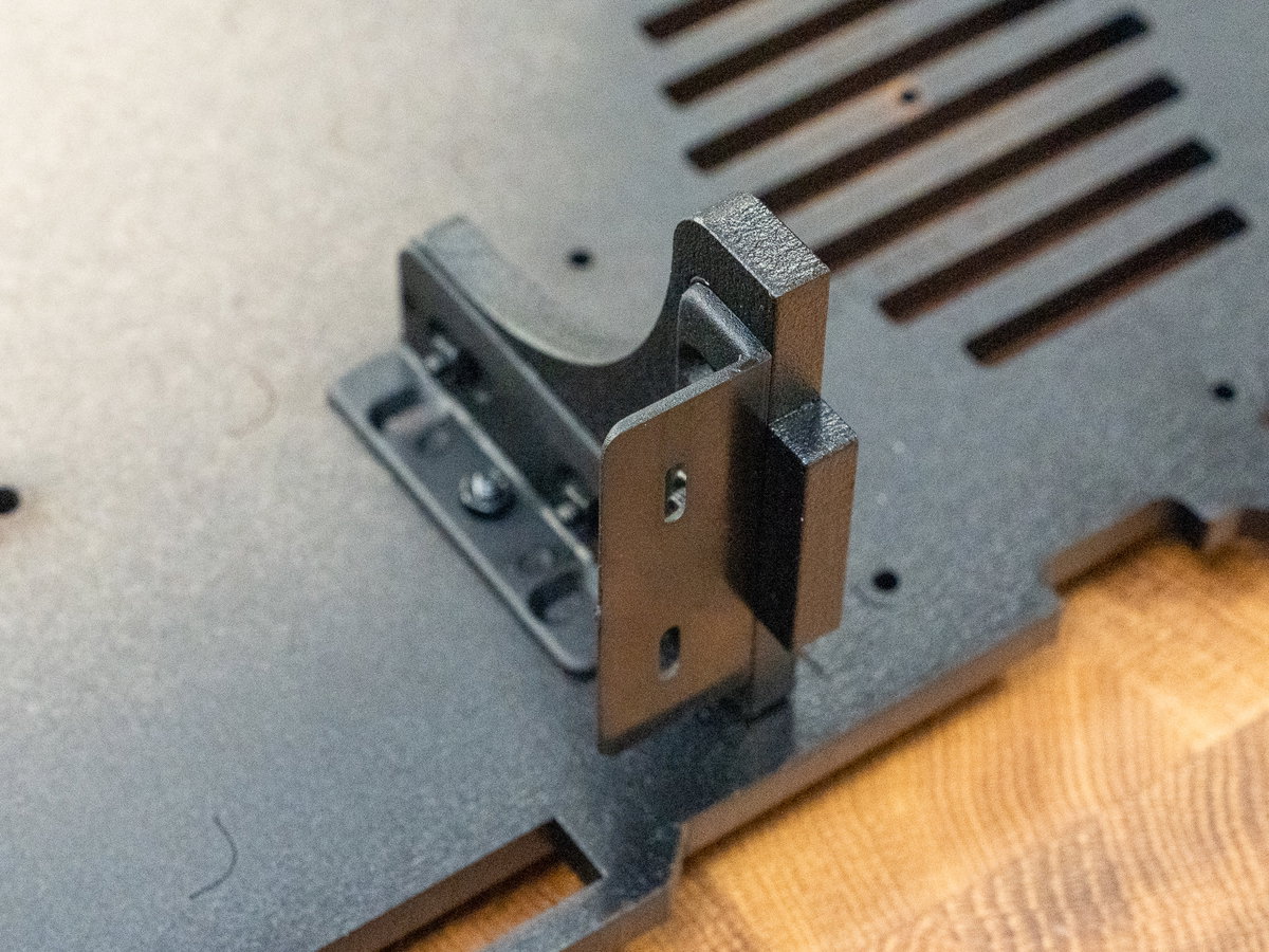Panels A and B joined with an L-shaped bracket