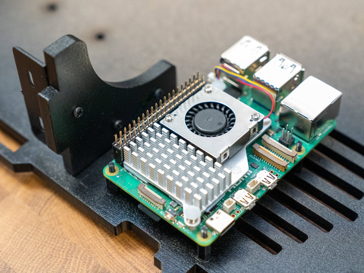 Raspberry Pi 5 positioned on the standoffs above panel A