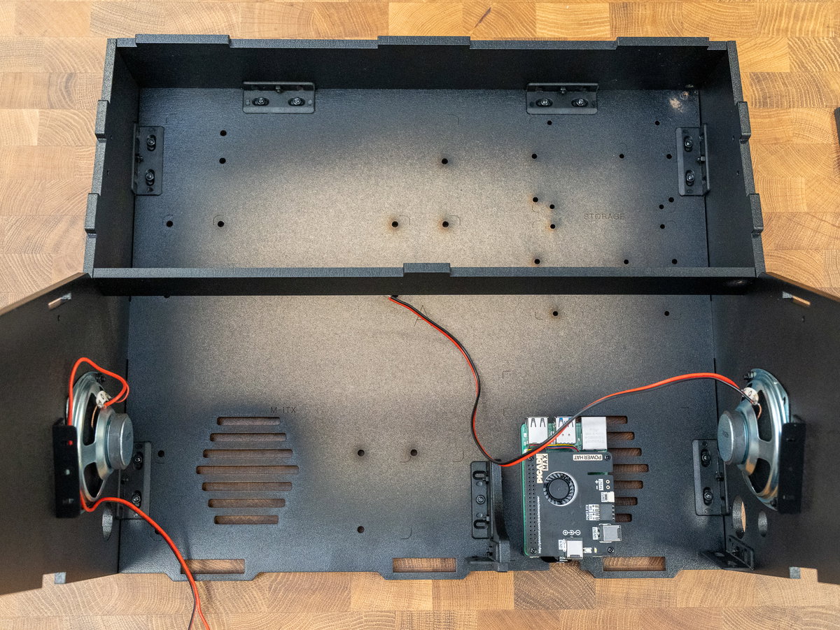 Wooden panel F fitted between side panels D and E