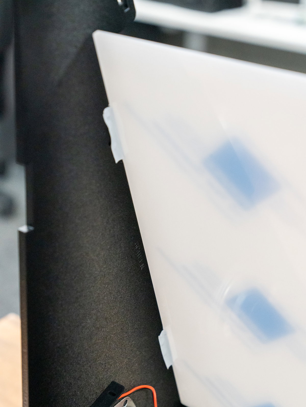 Acrylic screen panel tabs aligned with the side-panel slots