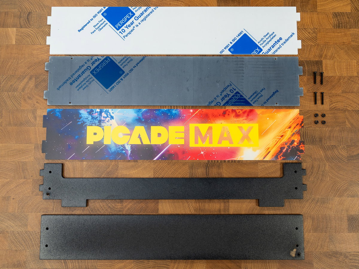 Transparent and black acrylic marquee panels, artwork, and wooden panels G and H