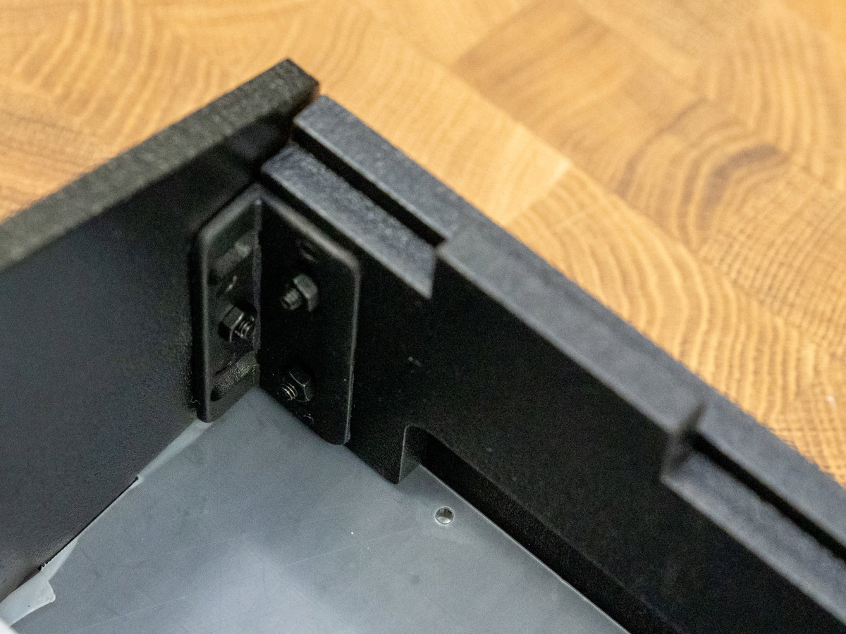 Wooden panel H aligned on top of panel G