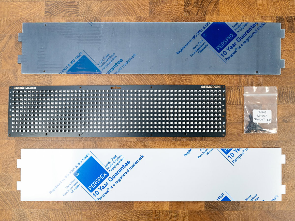 Clear acrylic overlay and translucent diffuser for a Unicorn marquee