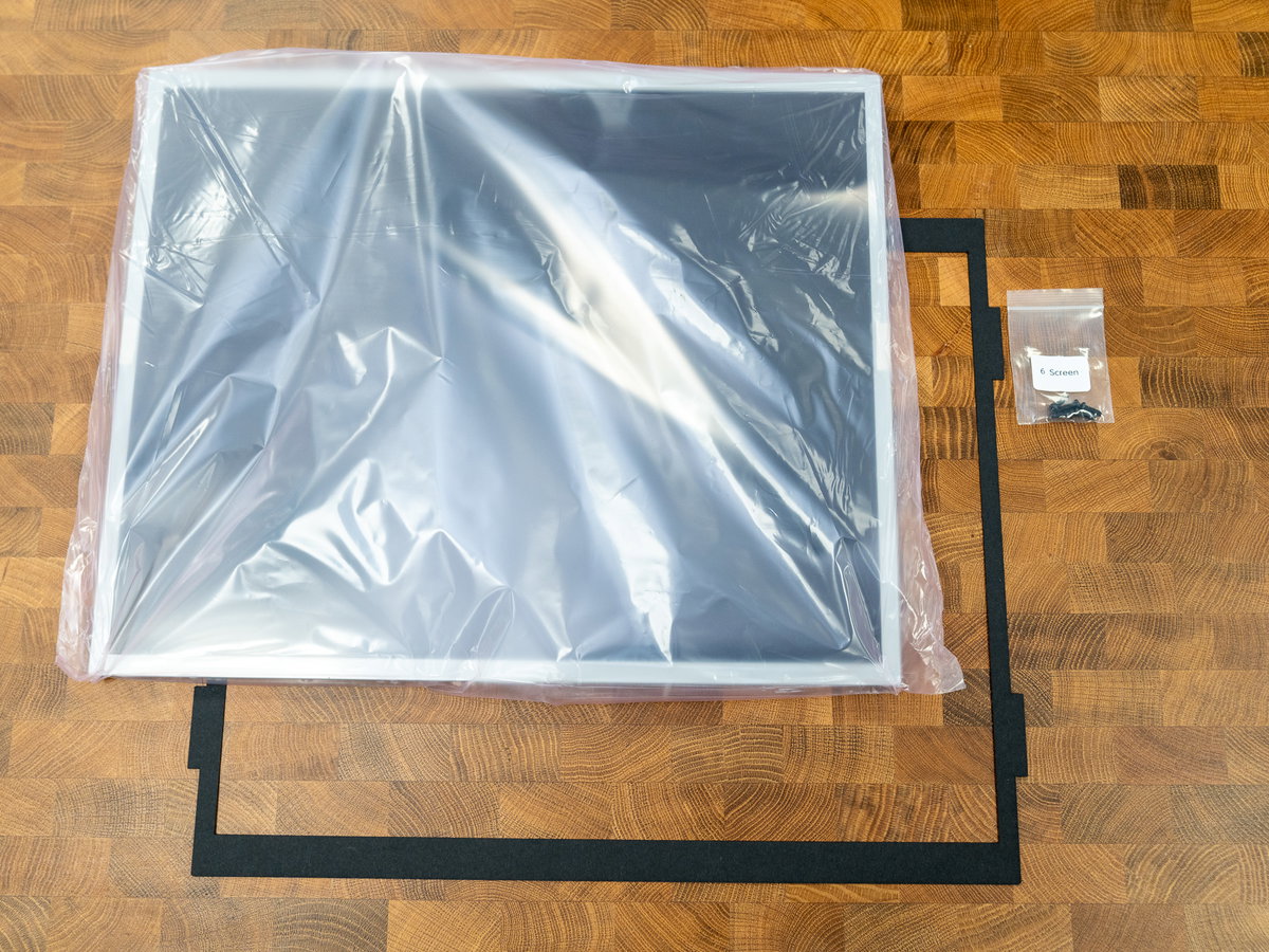 19-inch display panel and black cardboard screen surround