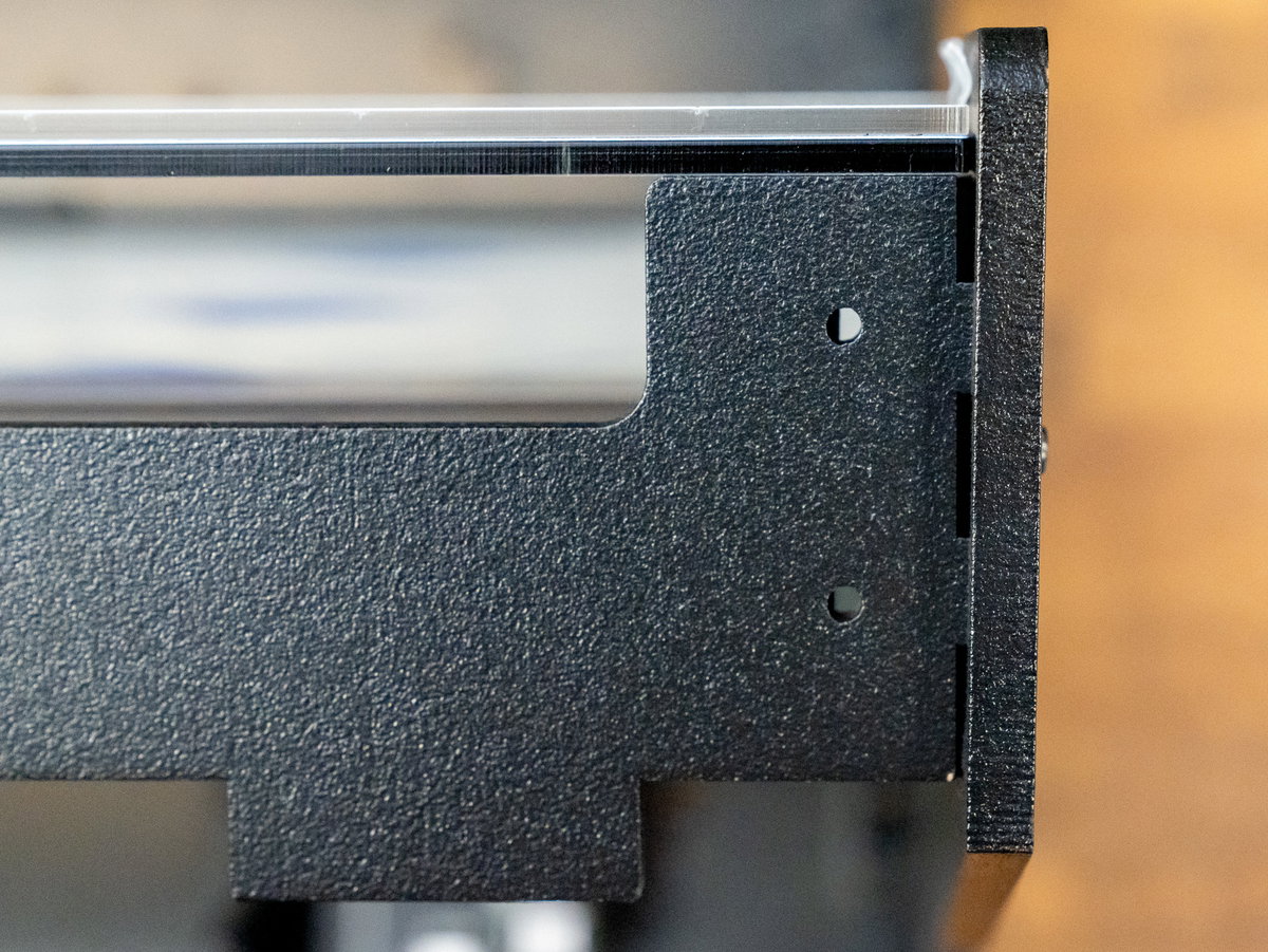 Tabs on wooden top panel G slotted into the Picade Max cabinet