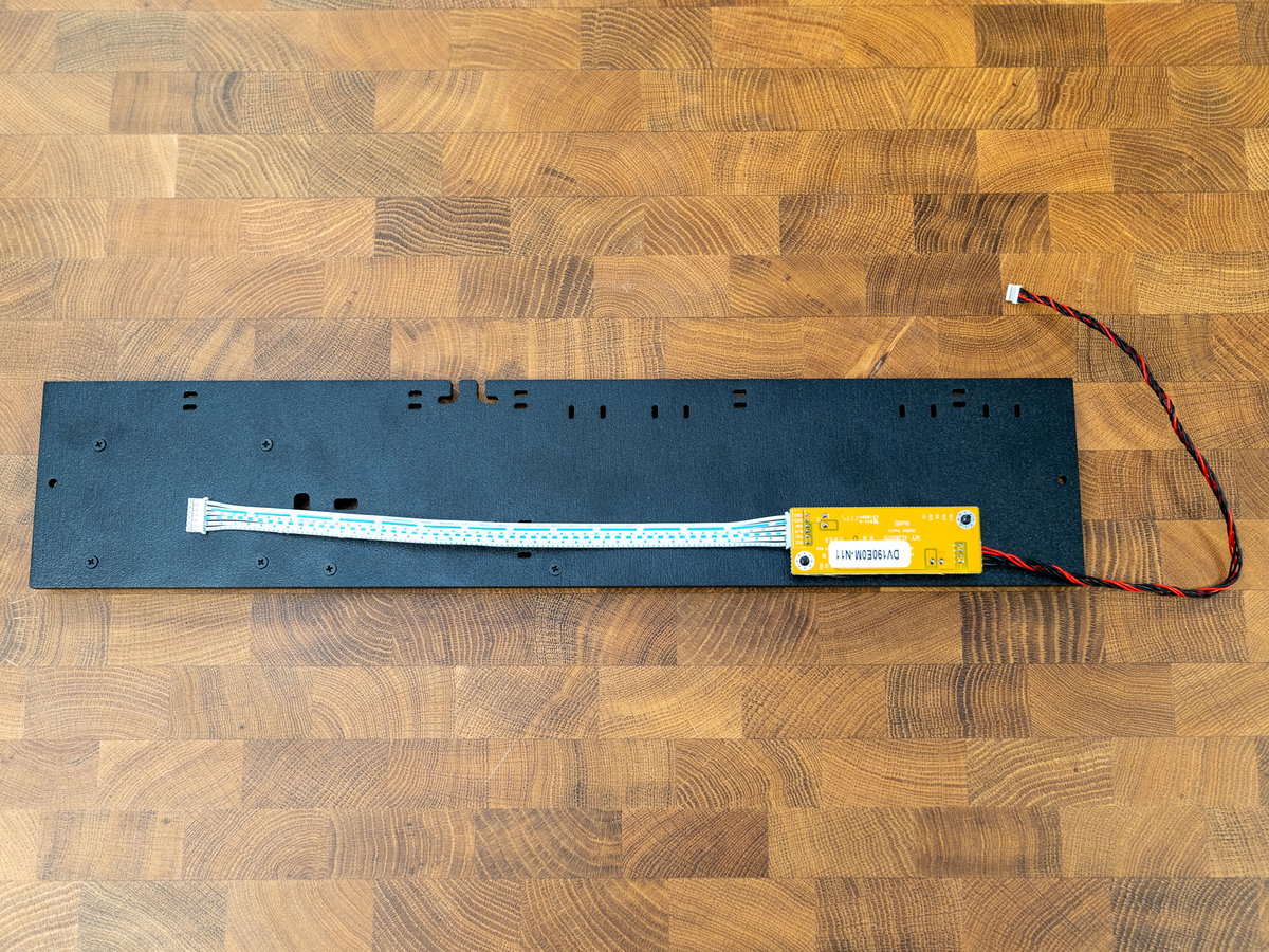 Smaller display driver board mounted on the reverse of panel K