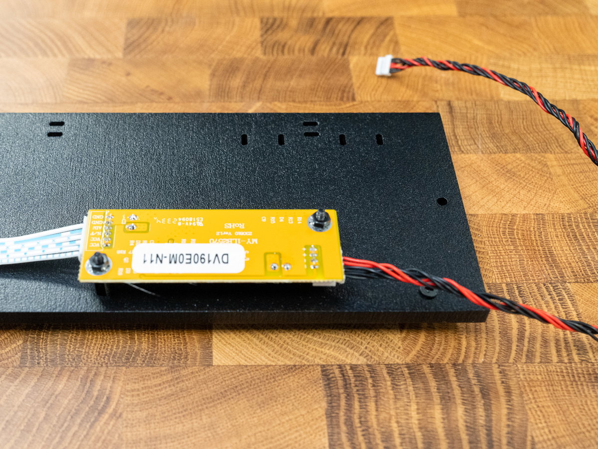 Nuts securing the smaller display driver board to panel K