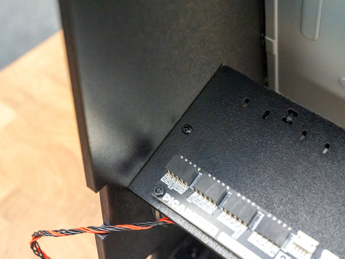 M3 screws and nuts securing panel K to the cabinet