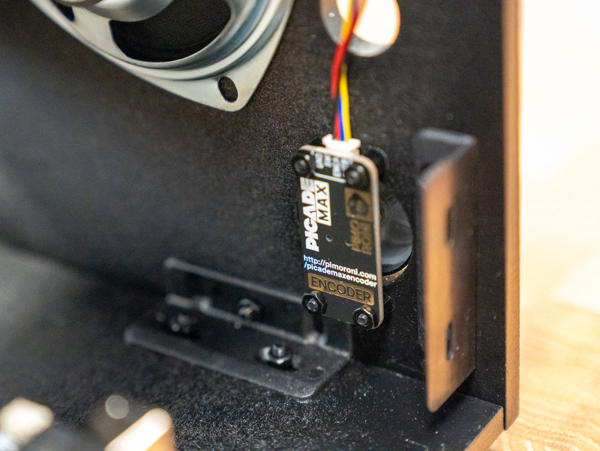Encoder board positioned behind the volume control opening