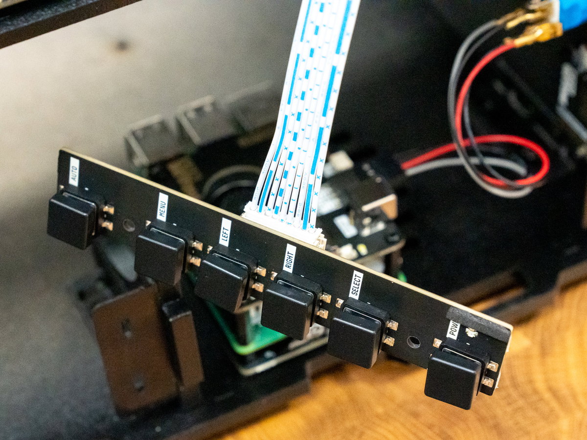 Nine-pin cable connected between the display driver and LCD Keypad boards