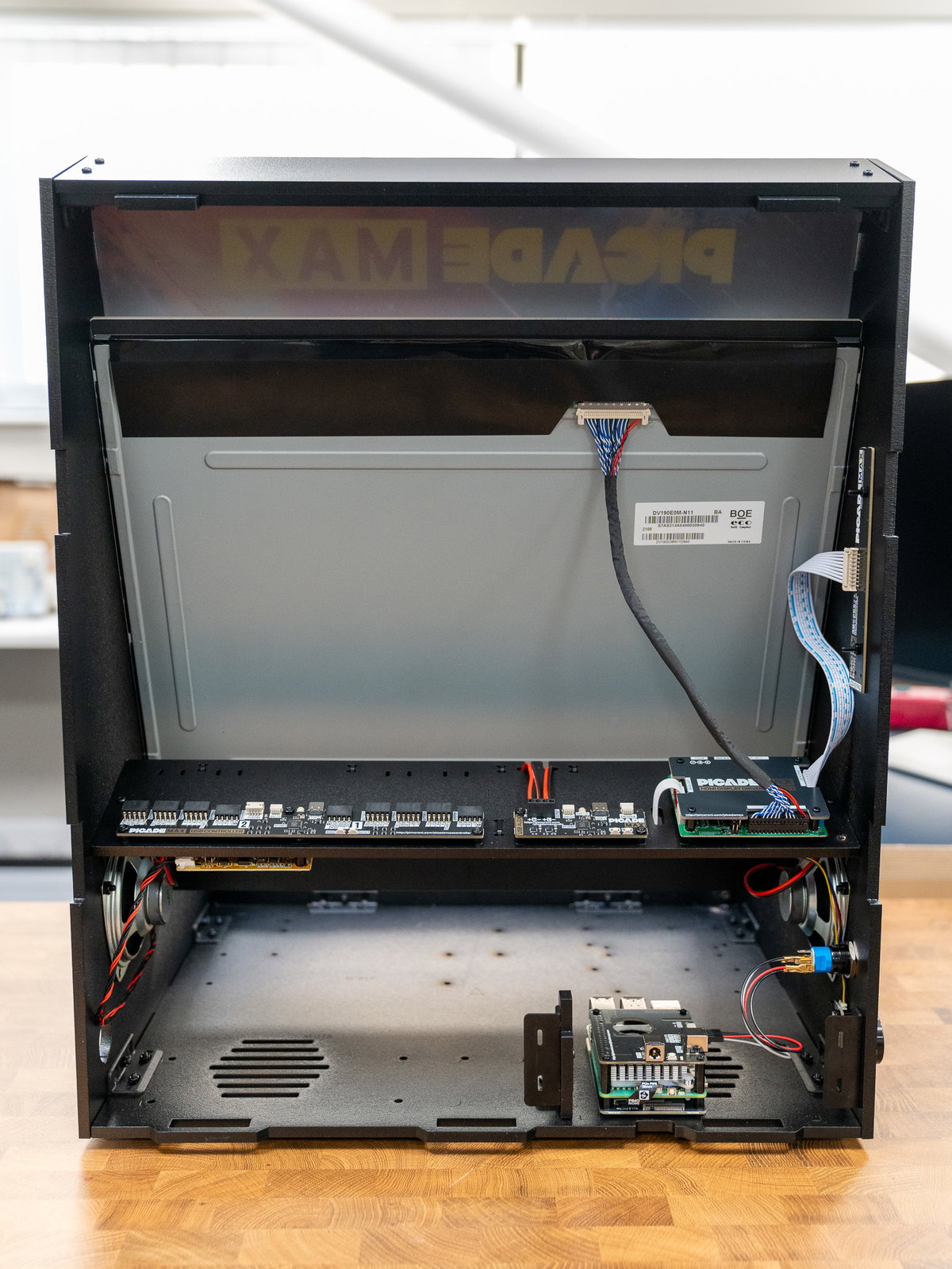 Picade Max cabinet with the electronics, volume dial, power button, and LCD controls installed