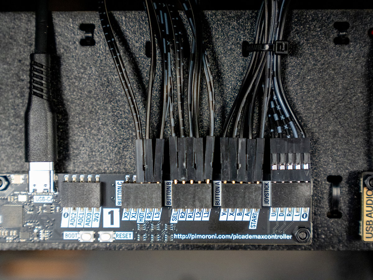 Two-player side button connected to the HOT terminal