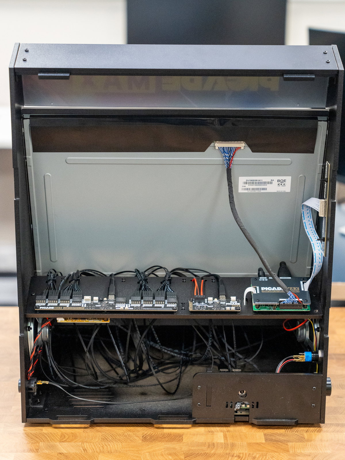 Backplate J secured to the cabinet with M3 screws and nuts