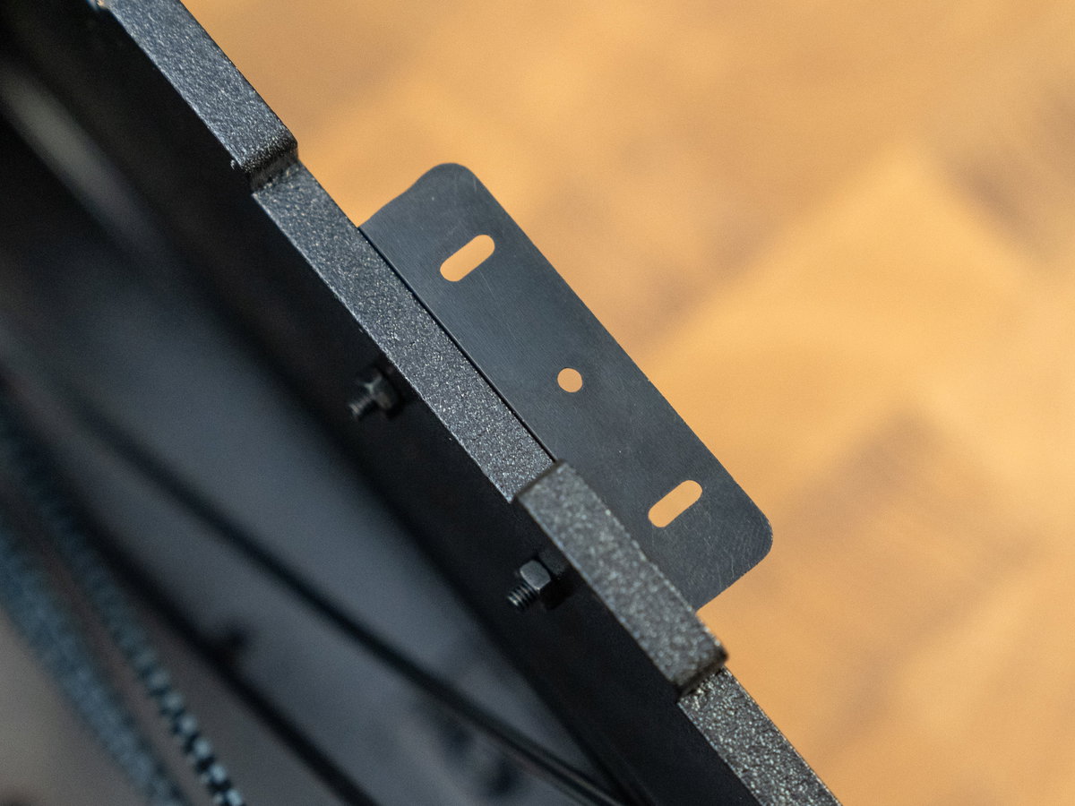 Second side bracket positioned for the final cabinet assembly