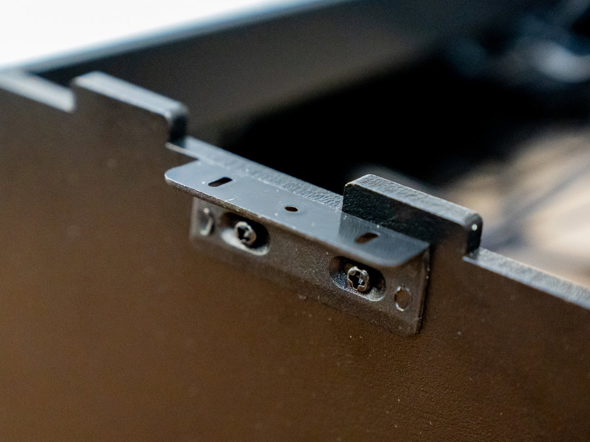 Side brackets secured to the Picade Max cabinet