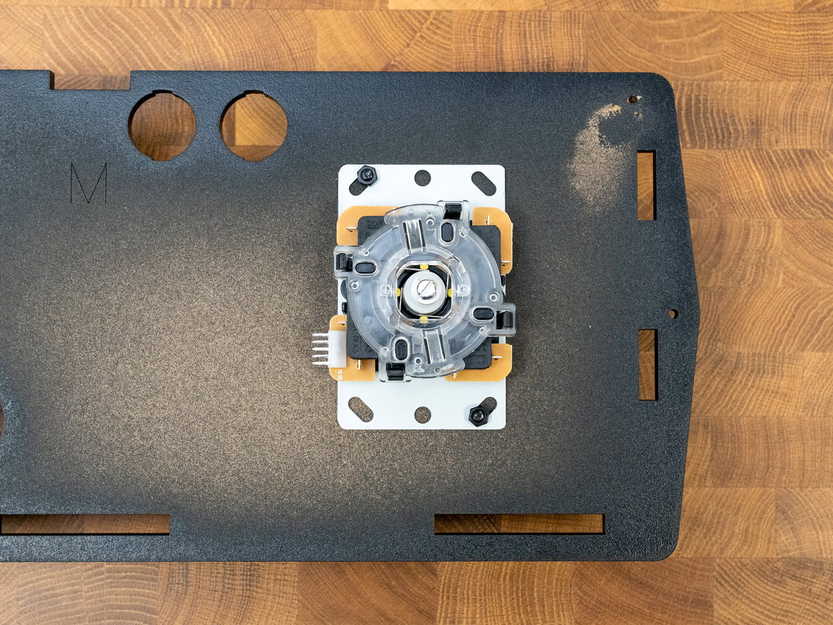 Joystick secured to the one-player console panel with M4 fixings