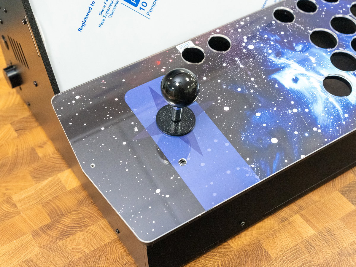 Joystick collar and ball fitted to the one-player console