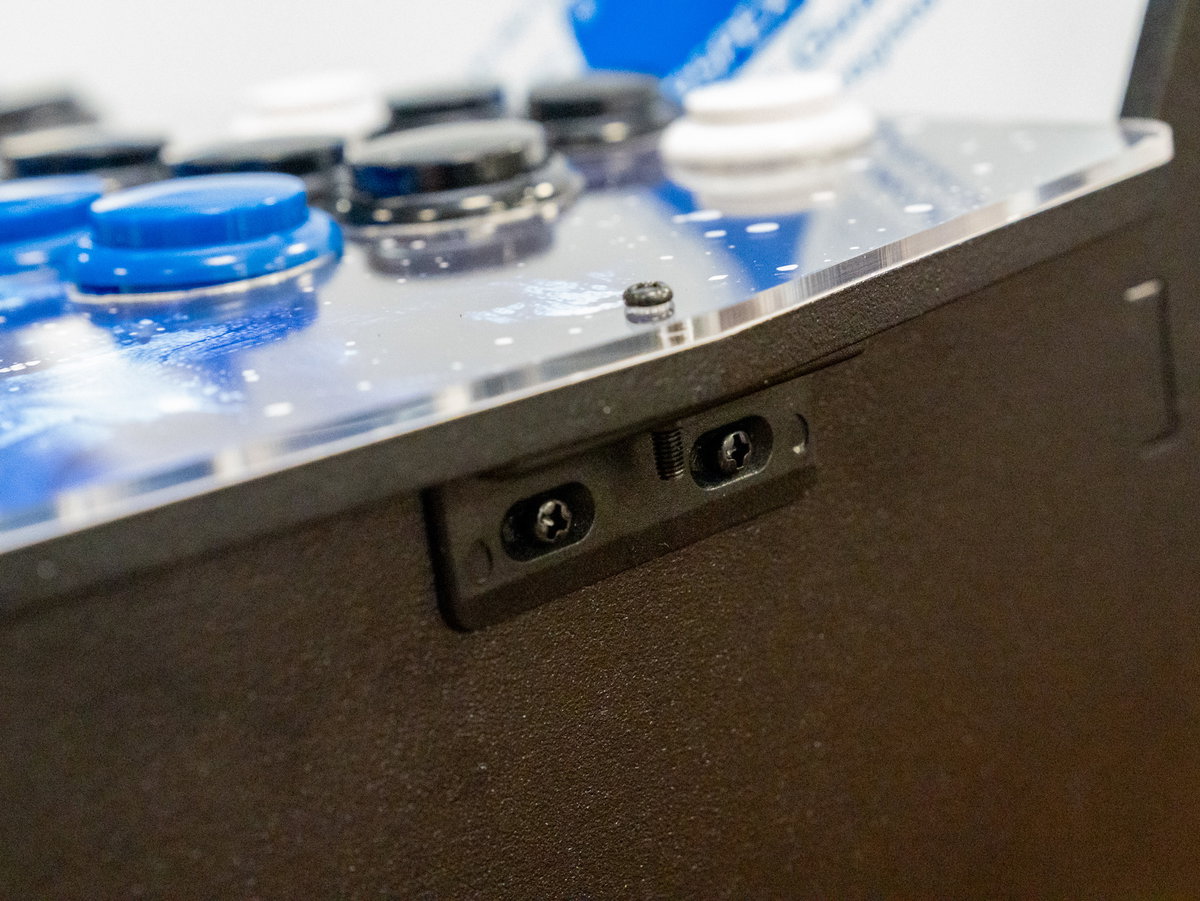 Console assembly attached to side brackets