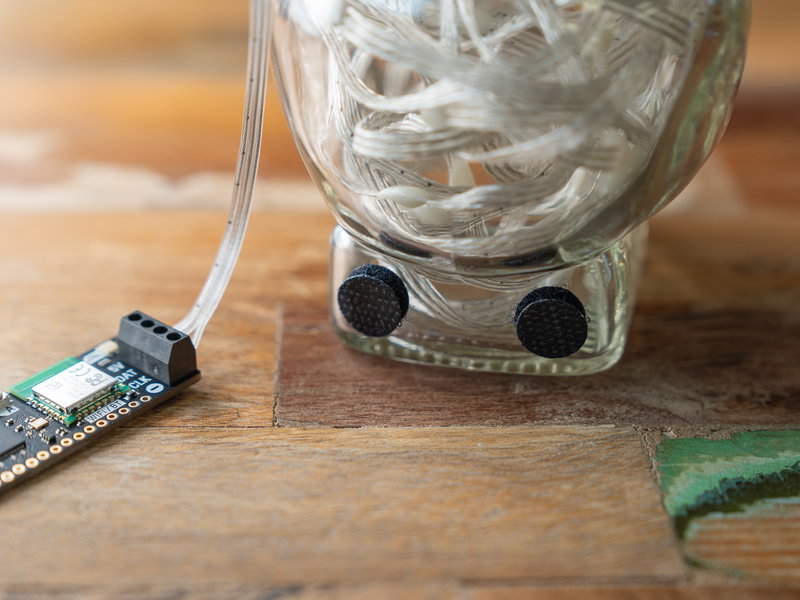 None Sticking the velcro to the bottle