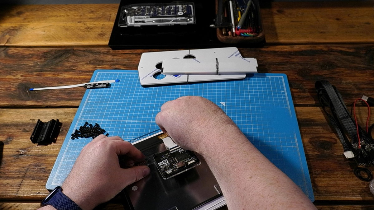 Wide ribbon cable connected between the screen and driver board