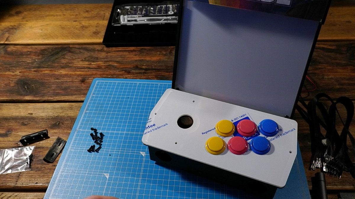 Console assembly with coloured buttons in place