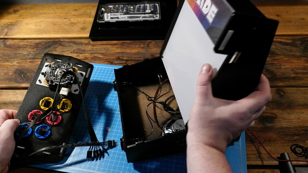 Console assembly with buttons and wires attached
