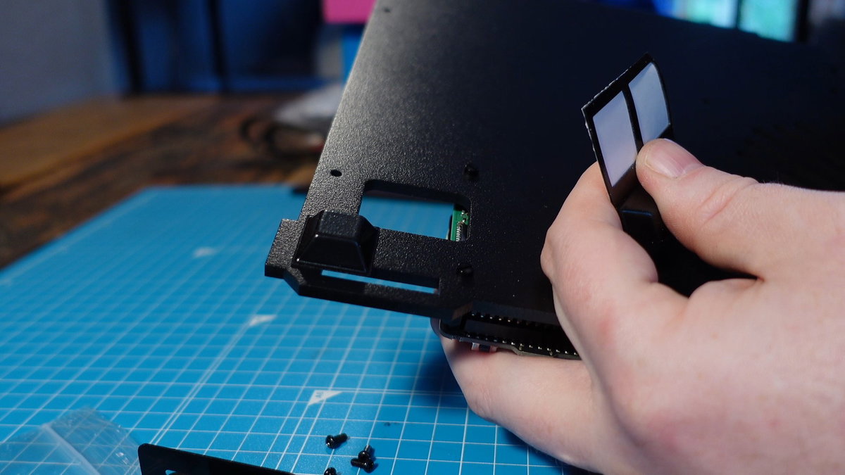 Rubber feet being fitted to the Picade base