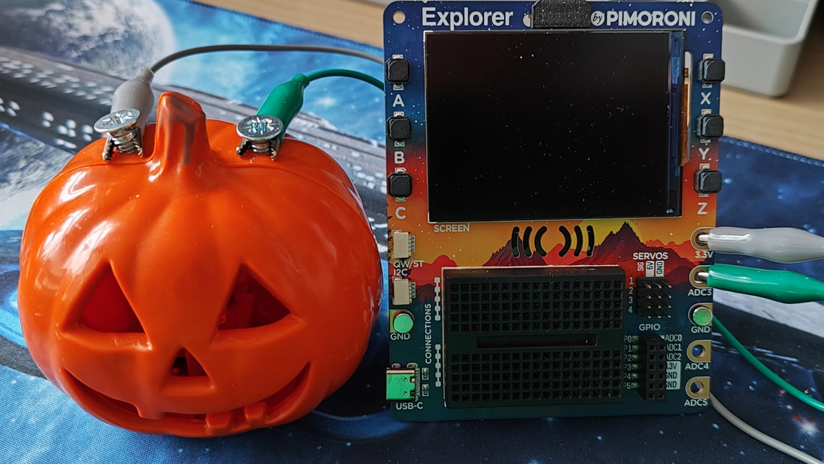 Croc clips connect Explorer to the pumpkin via screws in the plastic pumpkin shell