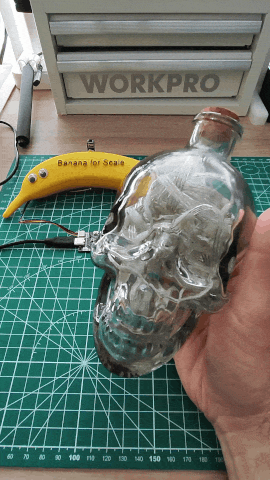 Testing the project by waving my hand in front of the sensor and triggering the LEDs