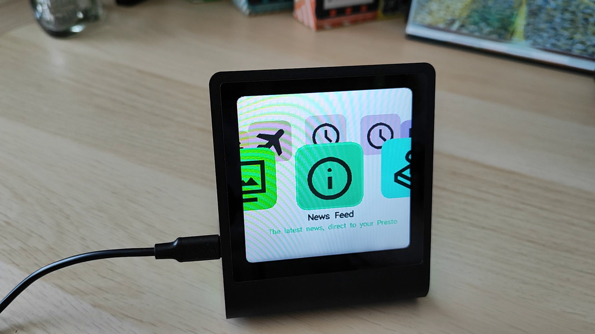 Presto launcher displaying the News Feed app with its information icon