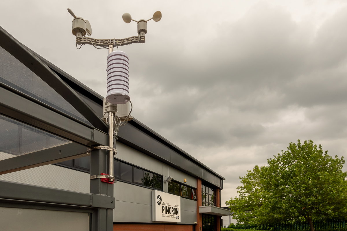 Assembled Enviro Weather and sensors in front of Pimoroni HQ