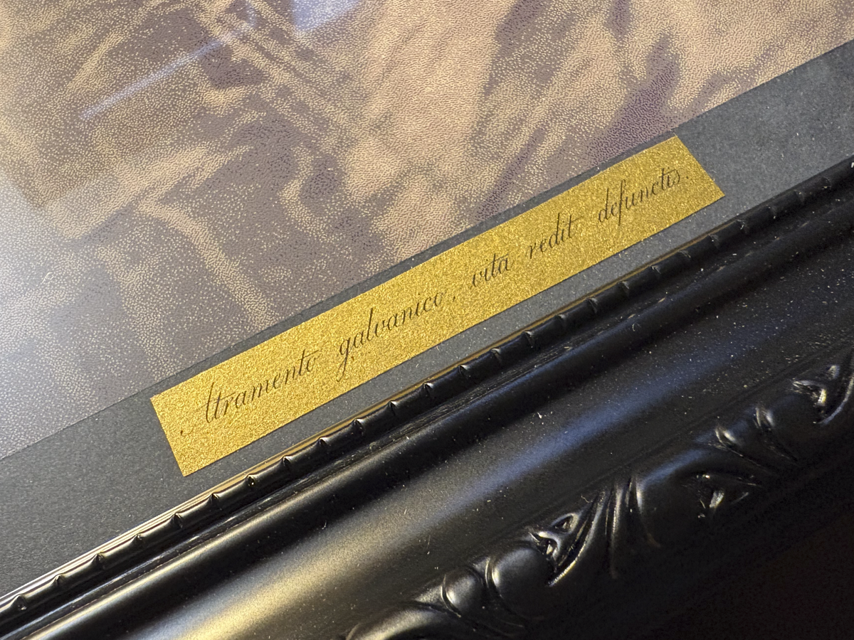 'Brass plaque' showing the motto