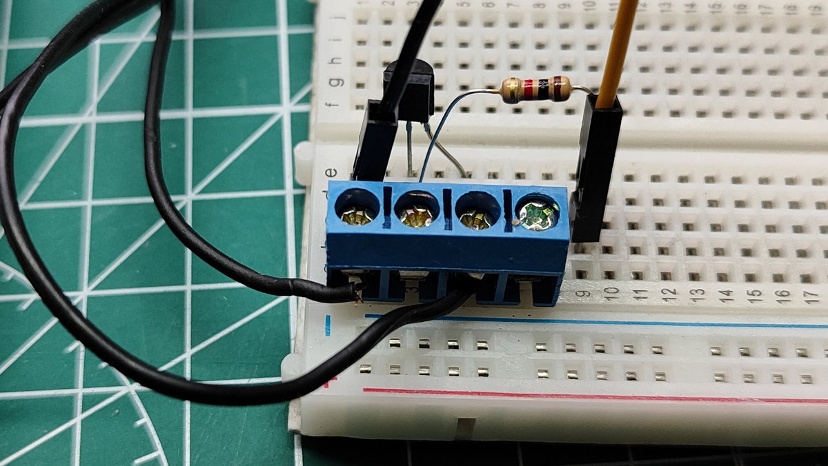 Both wires connected to the NPN transistor via a screw terminal